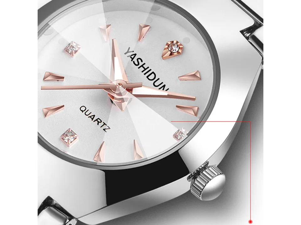 Close-up of the watch face showing the dial, hands, and crystal markers.