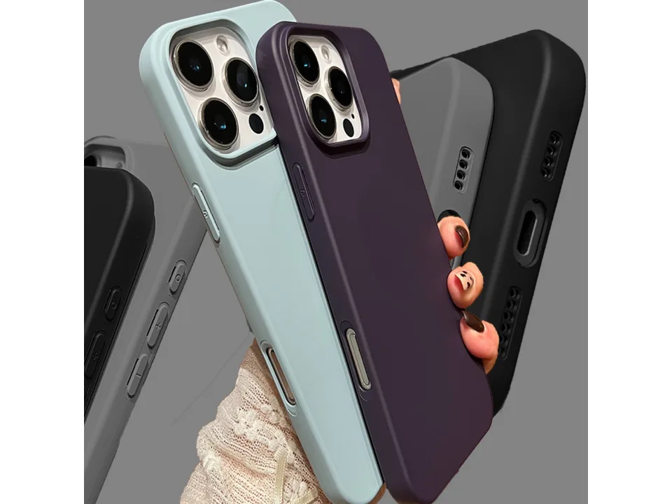 A hand holding several liquid silicone phone cases in different colors.