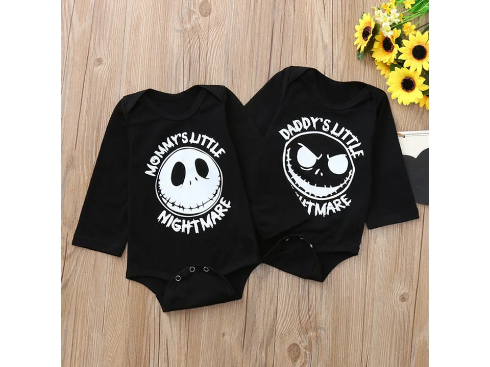 Two black baby bodysuits, one with 'Mommy's Little Nightmare' and one with 'Daddy's Little Nightmare' print.