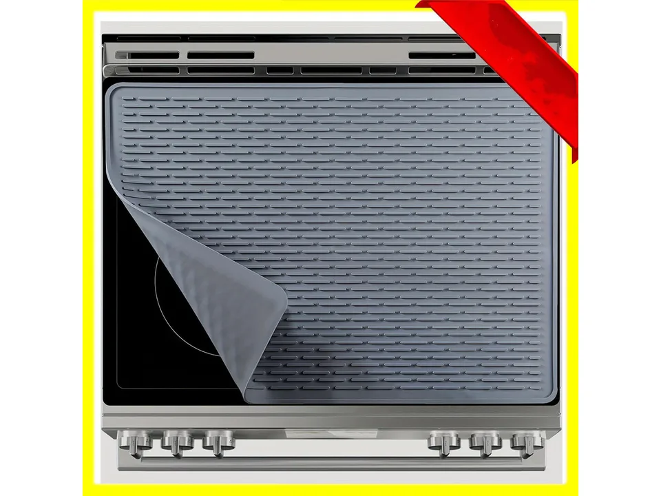 A grey silicone mat covering an electric stove top.