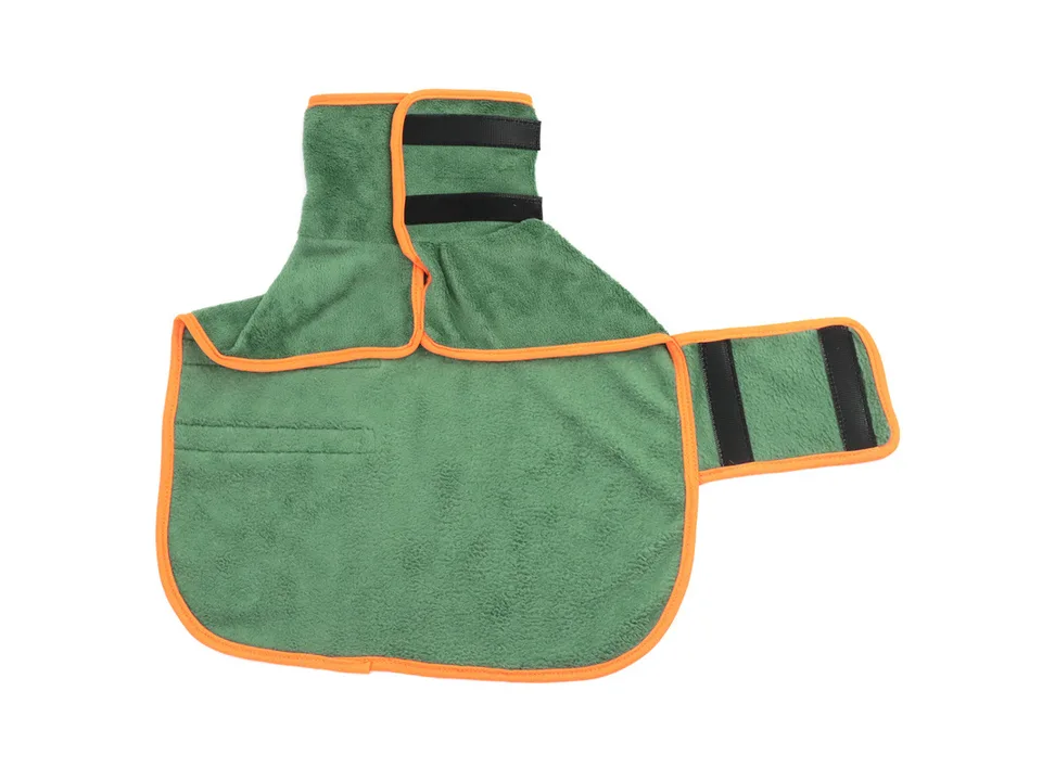 The green dog bathrobe laid flat, showing the velcro straps and orange trim.