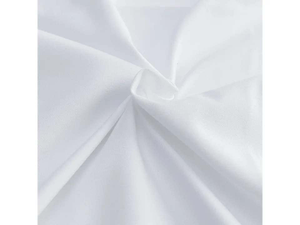 Close-up view of the white cotton fabric texture.