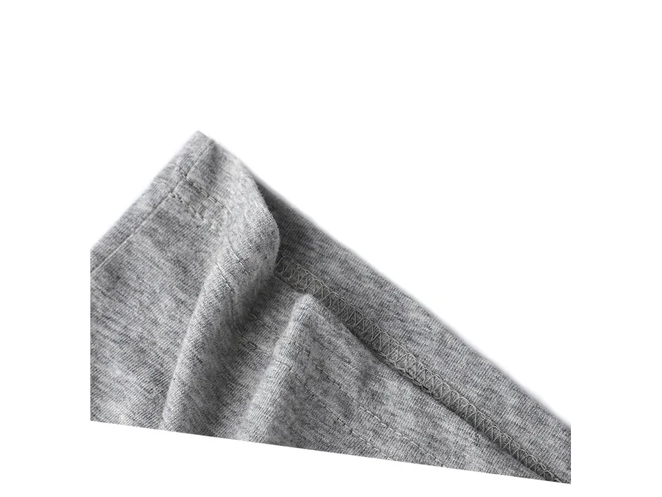 Close-up of the fabric and stitching on the sleeve of the t-shirt.