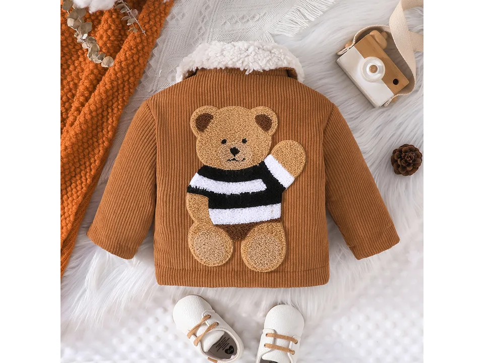 Back view of the brown corduroy jacket featuring a large bear applique.