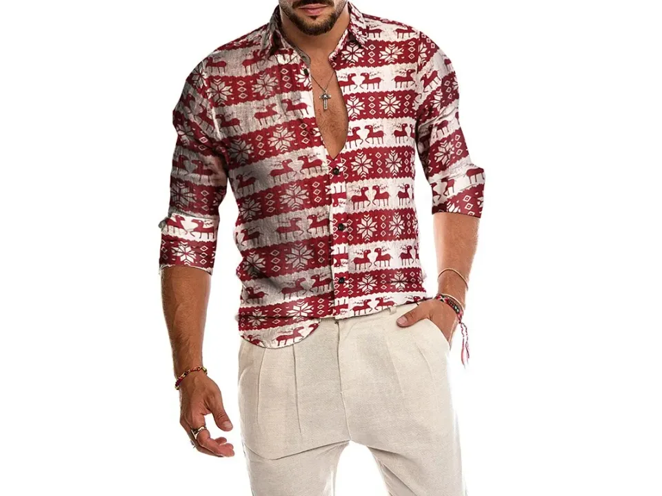 A man wearing a long-sleeved button-down shirt with a reindeer pattern, with sleeves slightly rolled up.