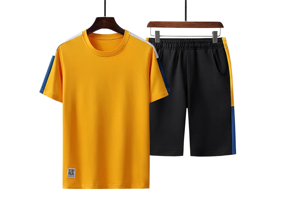 Yellow t-shirt and black shorts set with blue and white side stripes.