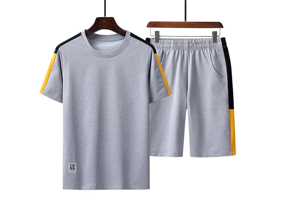 Grey t-shirt and grey shorts set with yellow and black side stripes.