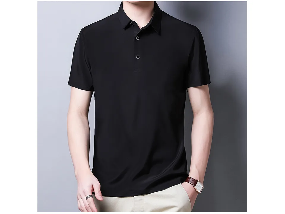 A man wearing a black short-sleeve polo shirt, front view.