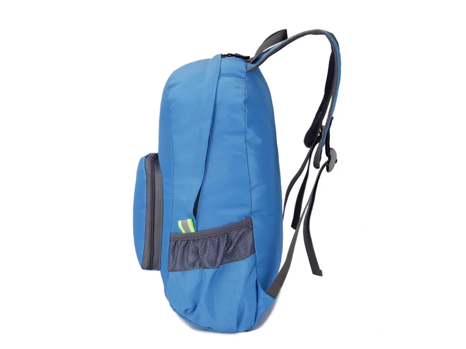 Side view of the blue backpack showing mesh pocket