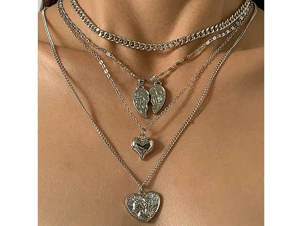 Close-up of the silver multi-layer heart pendant necklace set.