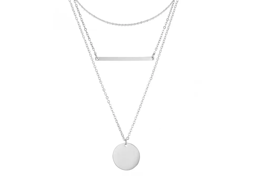 Silver multi-layer necklace with bar and disc pendants on a white background.