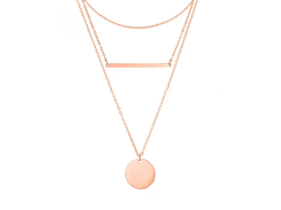 Rose gold multi-layer necklace with bar and disc pendants on a white background.