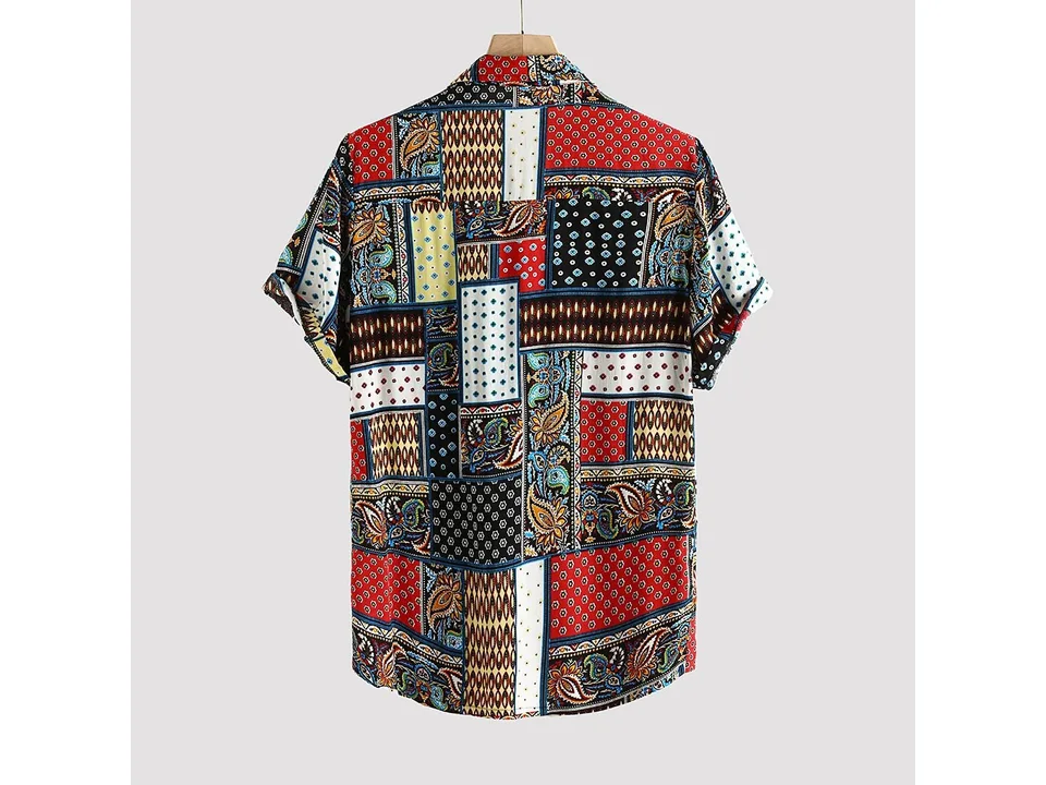 The back view of the same colorful patchwork print shirt, shown on a hanger.