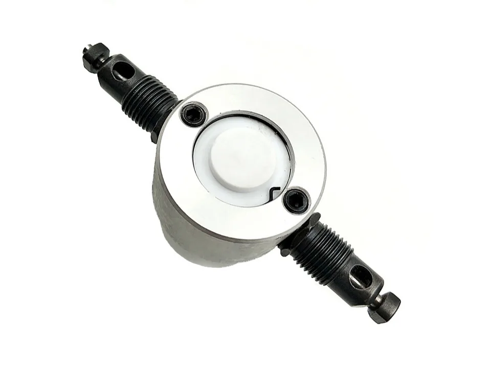Close-up view of the metal sheet nibbler cutting head mechanism.