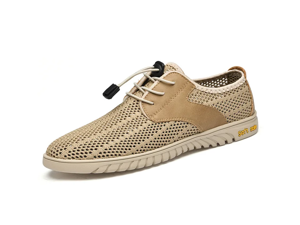Side view of a beige breathable mesh sneaker with toggle lacing.