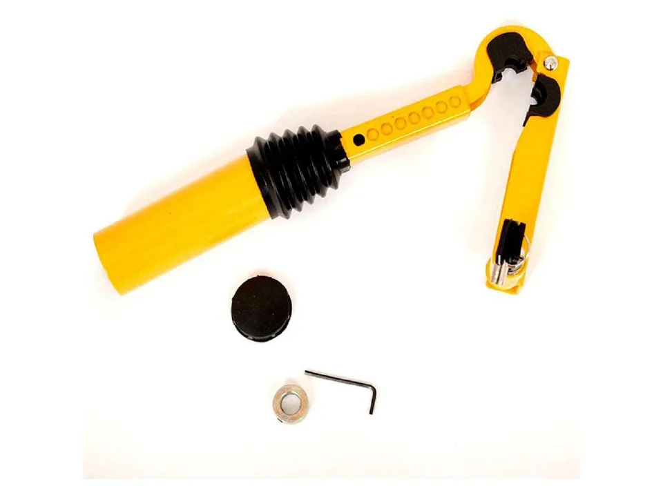 The gear shift security lock with its included accessories and keys.