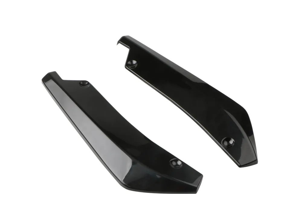 Two black rear bumper lip splitters angled for display.