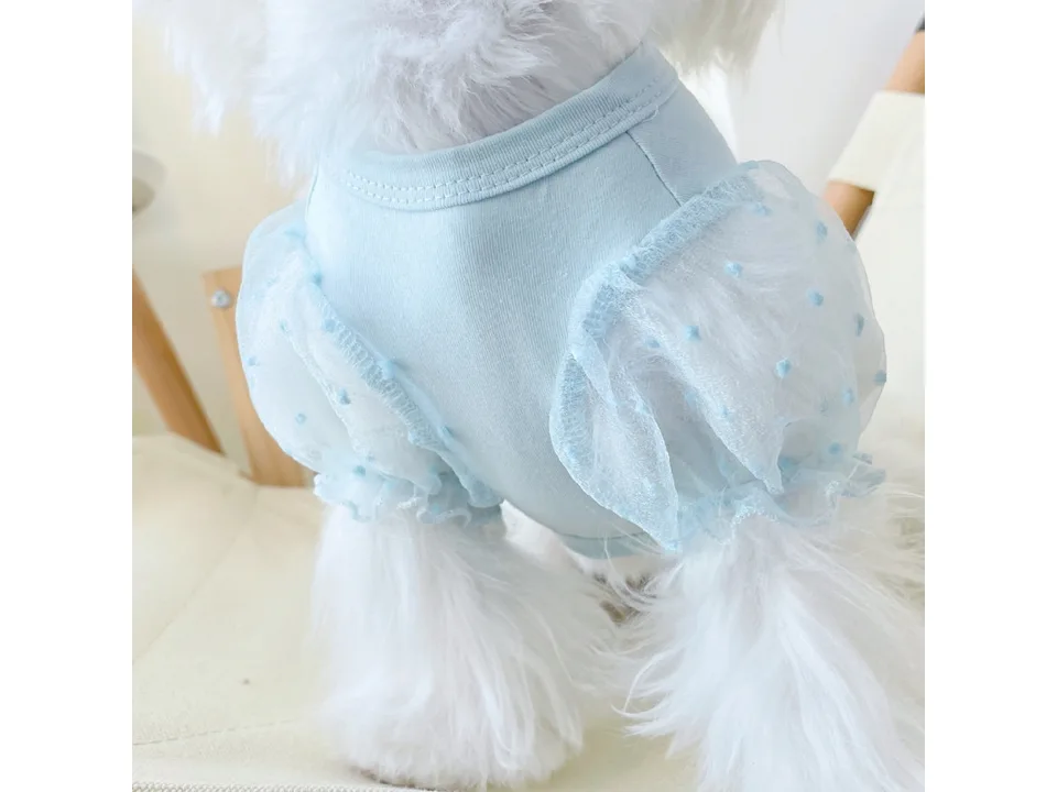 Close-up of the mesh puff sleeve detail on a light blue dog dress.