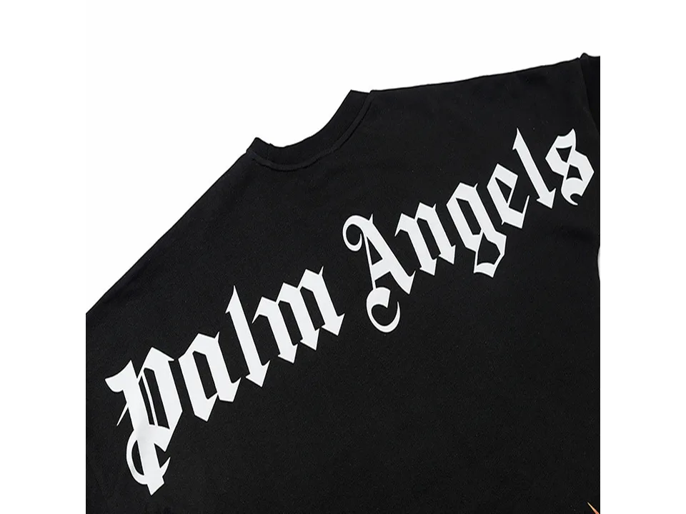 Close-up of the white Palm Angels logo printed on the back of the black sweatshirt.