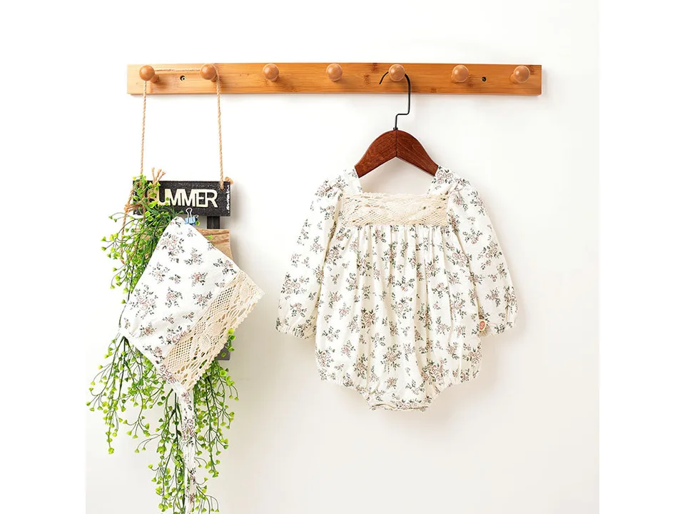 Long-sleeved version of the baby floral romper with matching bonnet.