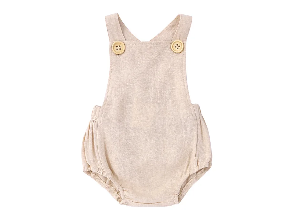 Beige baby romper with wooden buttons