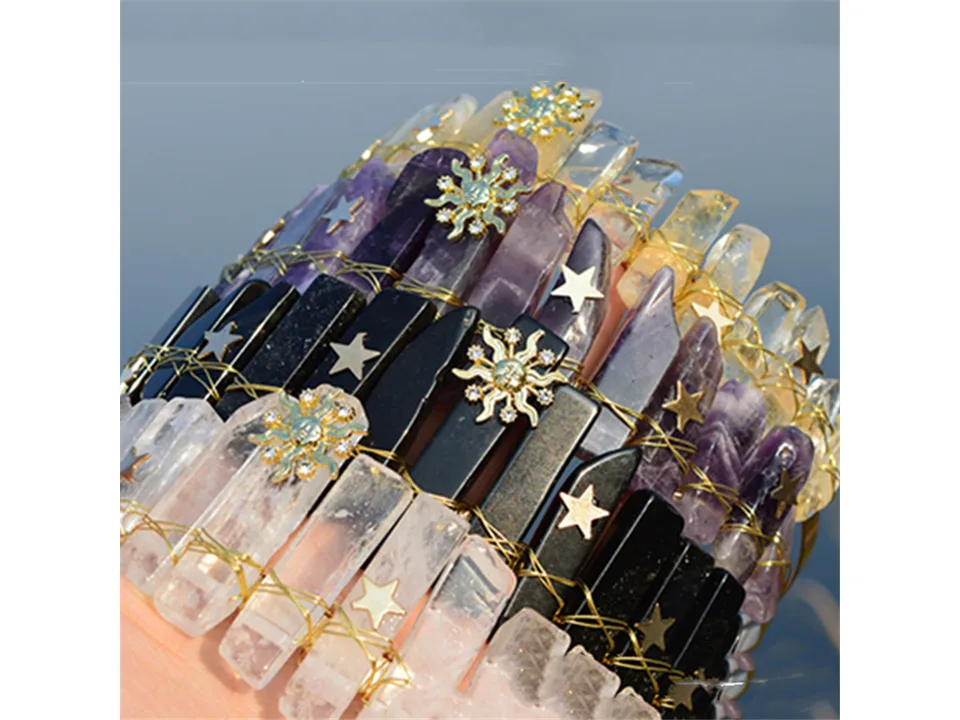 A collection of crystal crown headbands in various colors like clear, black, and purple.