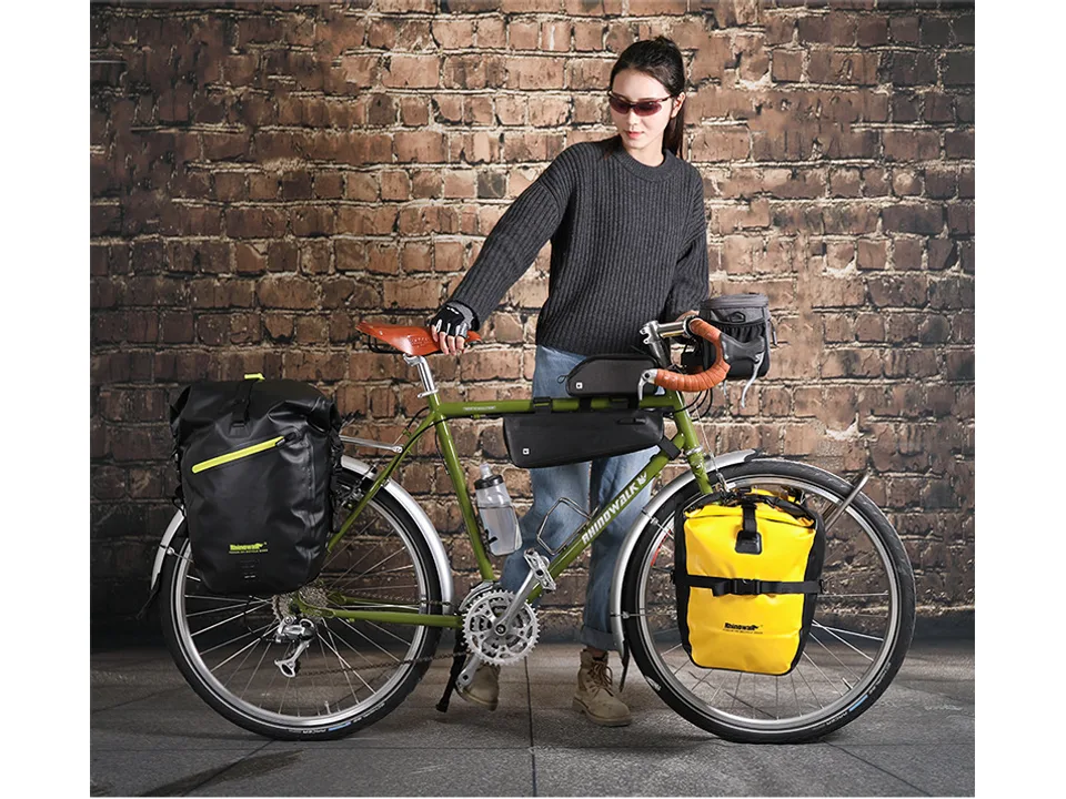 Yellow pannier bag mounted on the front rack of a bicycle