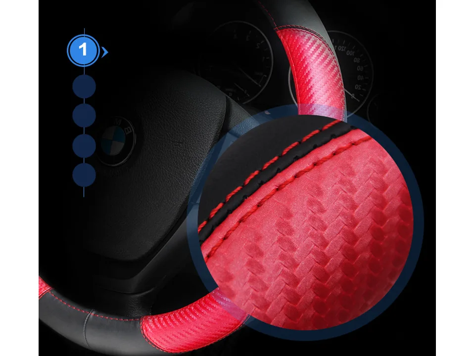 Close-up view of the red carbon fiber texture and stitching on the steering wheel cover.