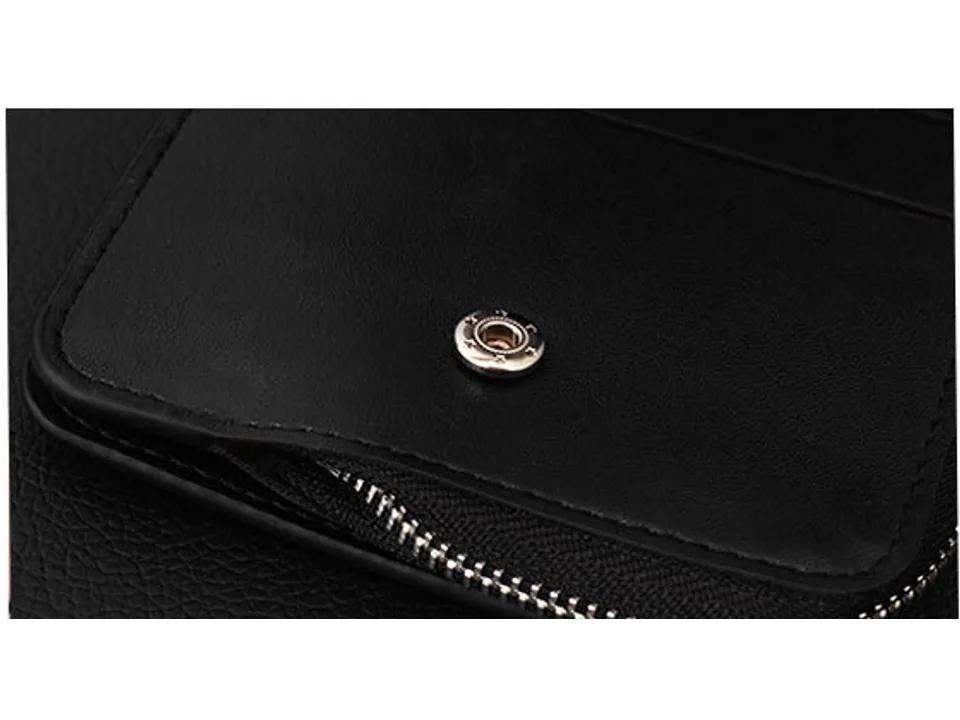 Close-up of the wallet's snap button and zipper closure.