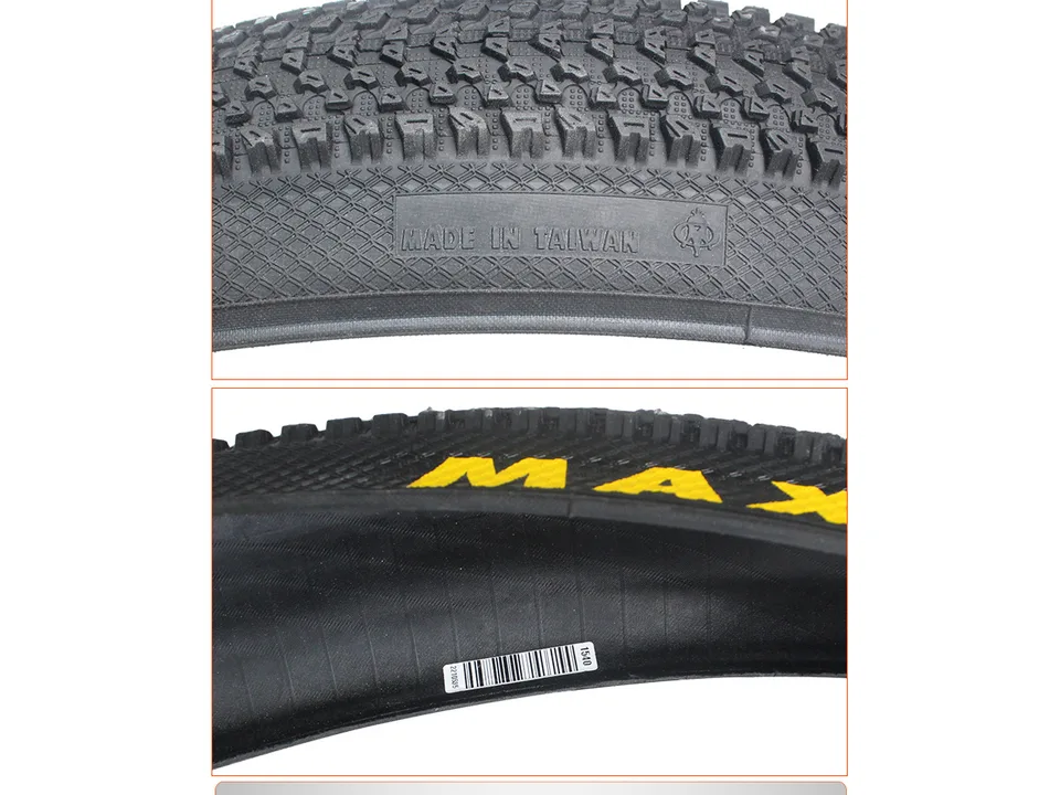 Close-up of the tire sidewall showing the rotation direction arrow.