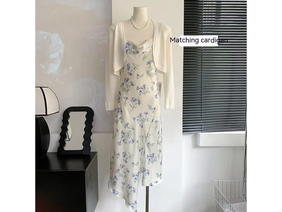 The floral slip dress styled with a matching white cardigan.
