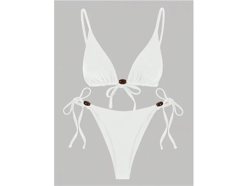 A white two-piece bikini with decorative brown beads on the top and sides.