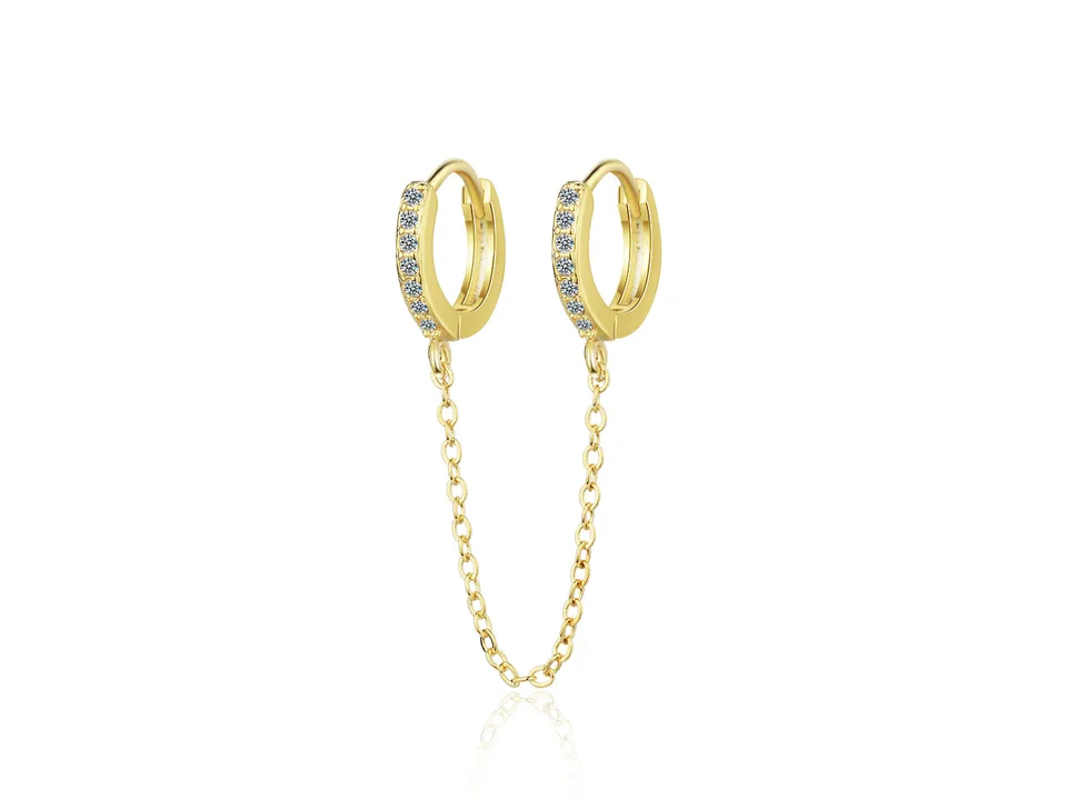 A pair of gold hoop earrings connected by a delicate chain, featuring small embedded crystals.