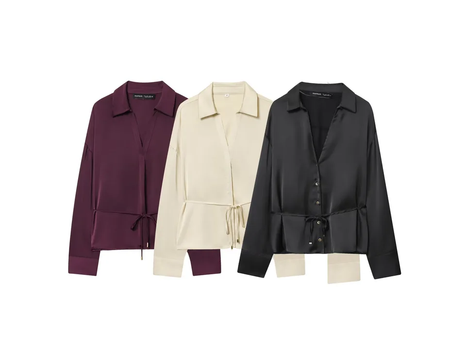 Three long-sleeve button-down shirts in burgundy, cream, and black, displayed together.