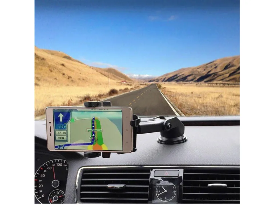 Car phone holder mounted on a dashboard displaying a navigation map.