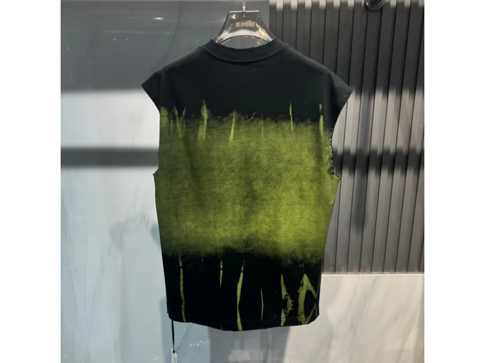 Back view of the black and green gradient sleeveless tank top.