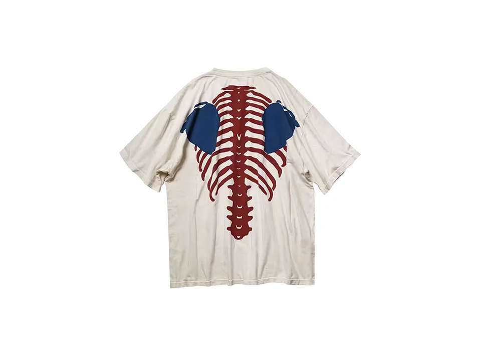 White t-shirt with a red and blue skeleton rib cage print on the back.
