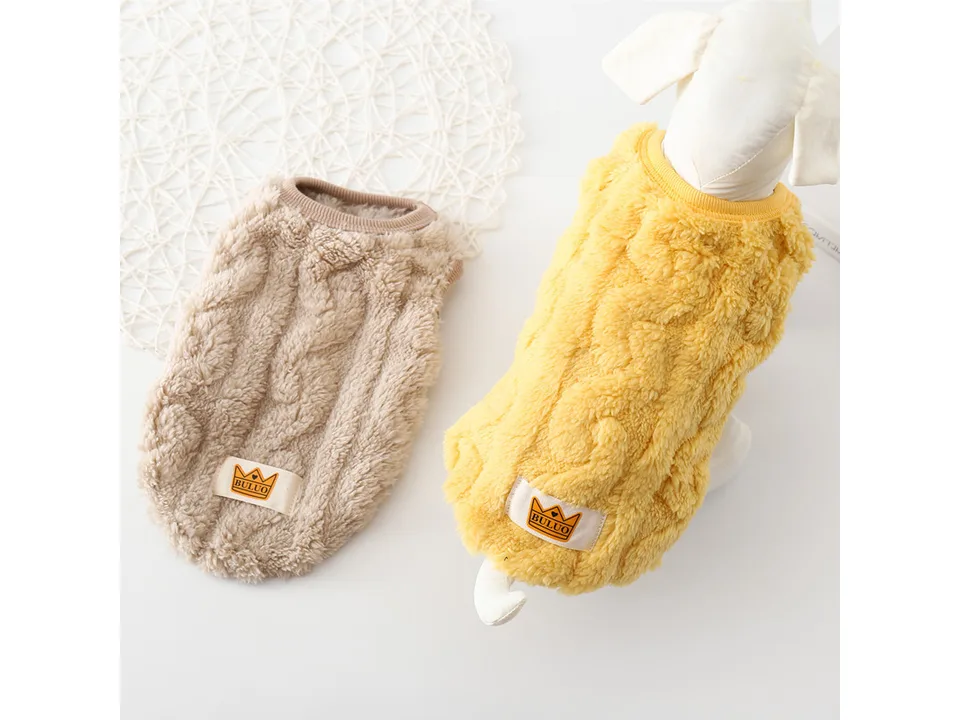Two warm fleece dog vests in yellow and beige on a mannequin.