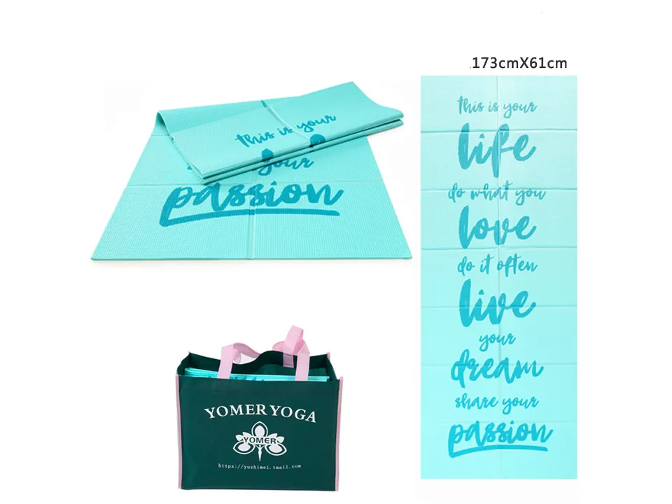Teal foldable yoga mat with inspirational text and a green carrying bag.