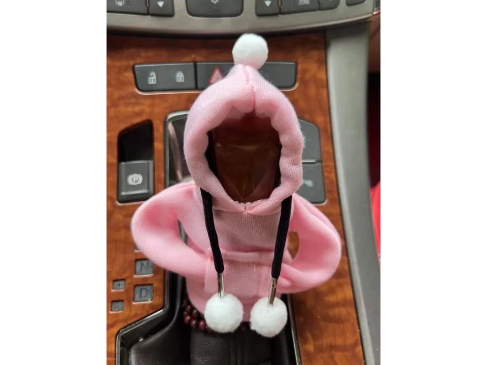 Pink hoodie cover on a car gear shift knob