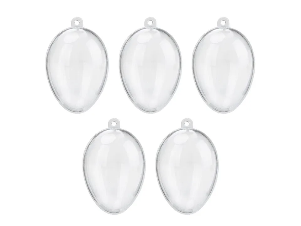 Five empty clear egg-shaped plastic ornaments.