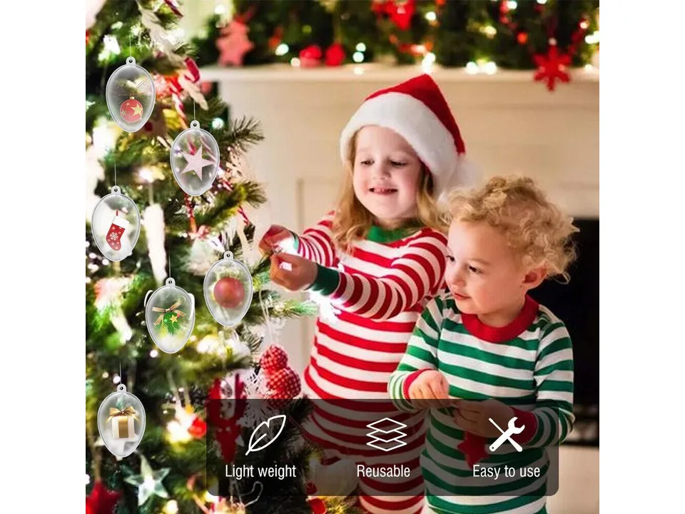 Two children decorating a Christmas tree with clear fillable ornaments.