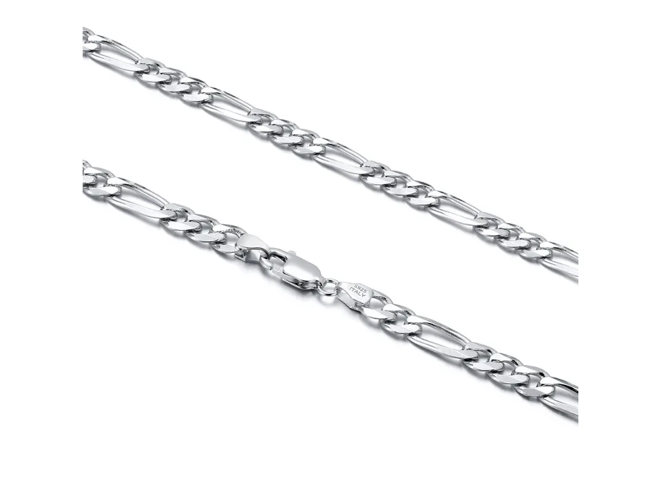 A silver Figaro chain necklace laid out to show the full length and clasp.