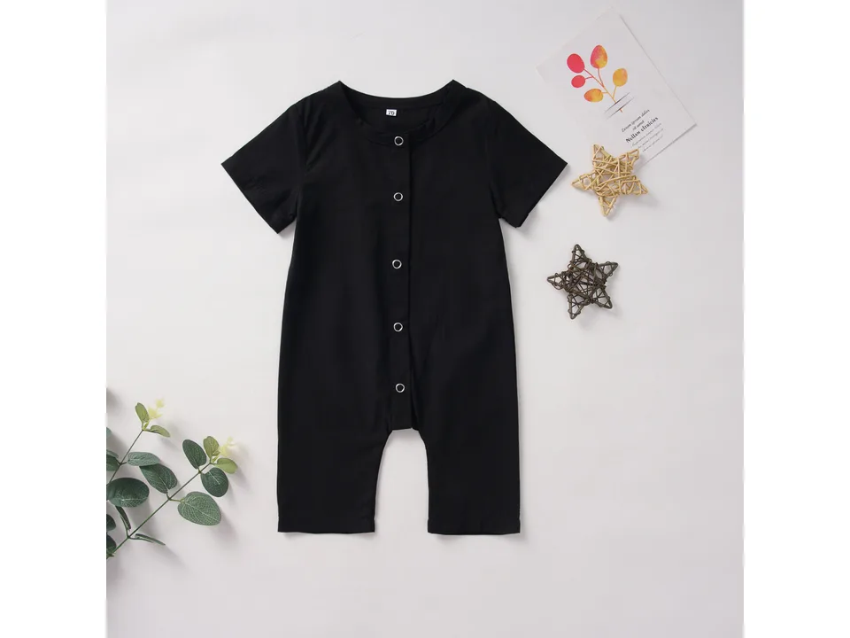 Black baby romper with short sleeves and front buttons.