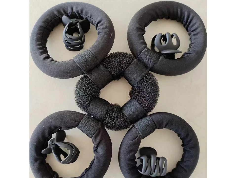A heat-free hair curling set with four fabric-covered rings and a central foam piece.