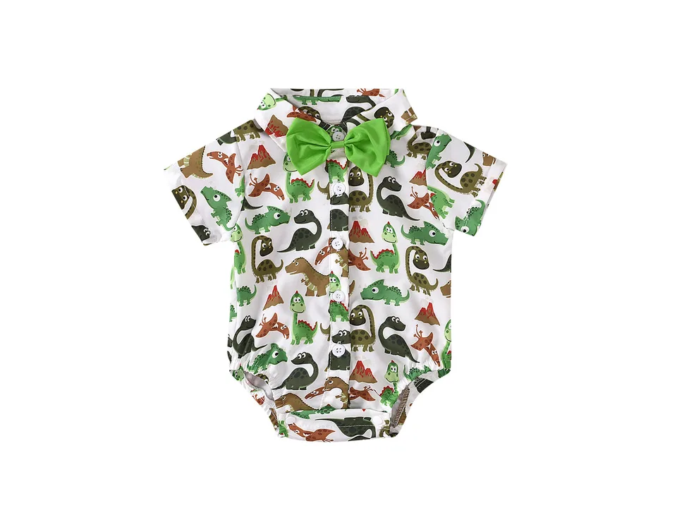 Dinosaur print baby romper with a green bow tie.