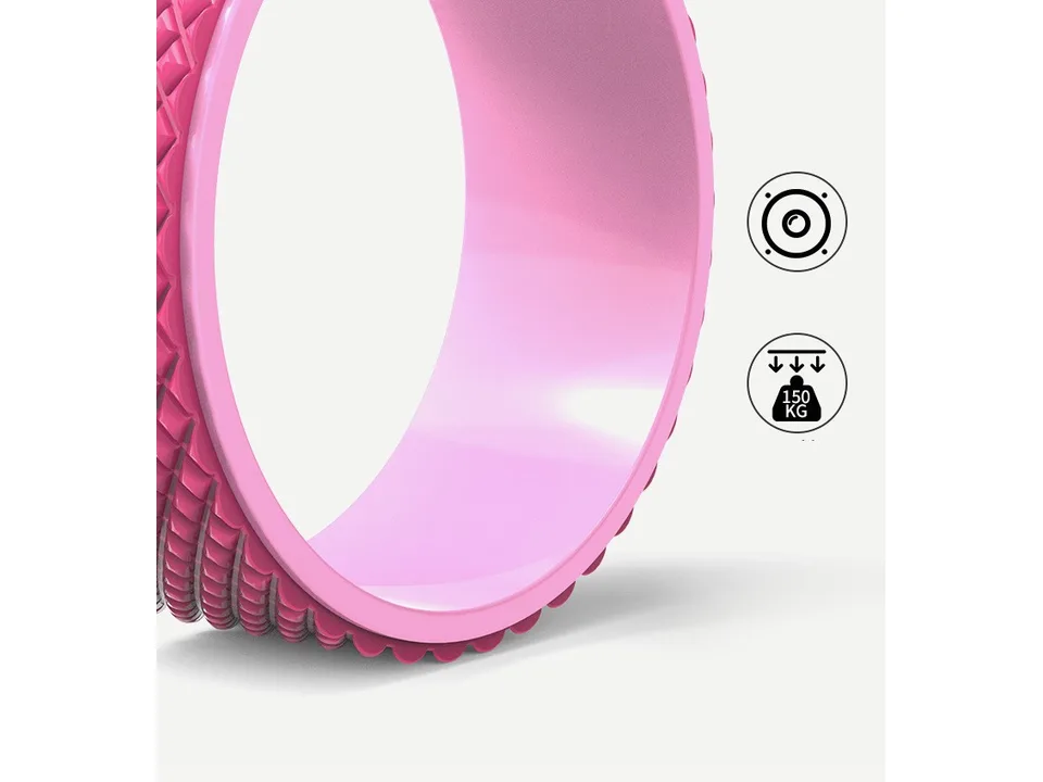 Pink yoga wheel with icons indicating weight capacity.