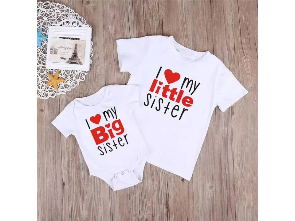 White matching sister t-shirt and romper set with red heart text.