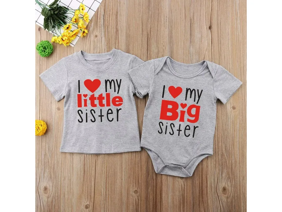 Grey matching sister t-shirt and romper set with red heart text.