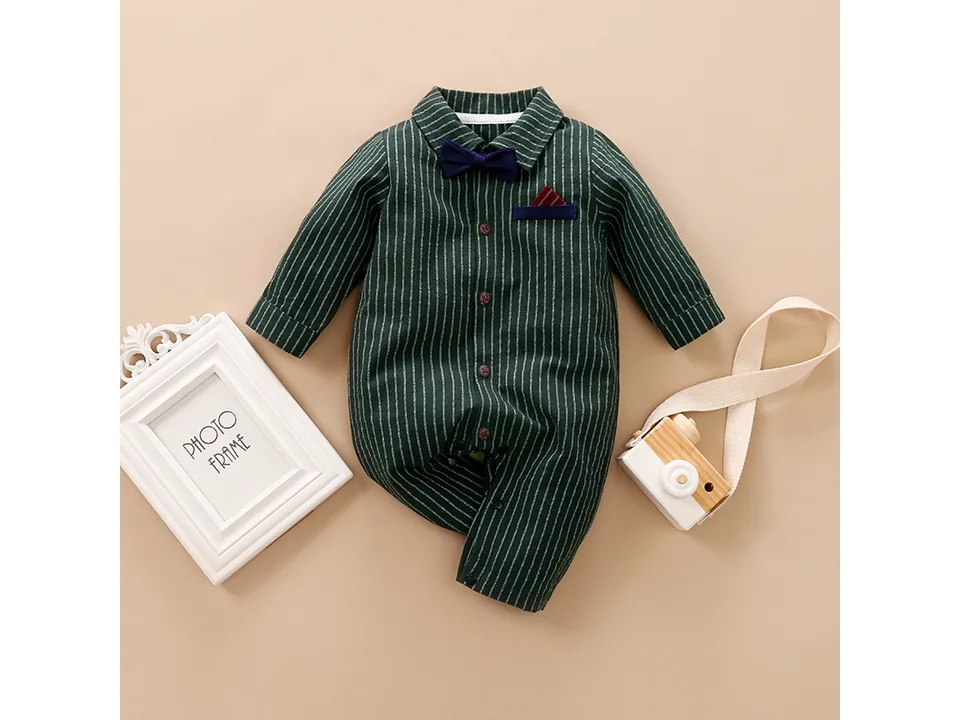 Full view of the green striped baby romper with a bow tie.